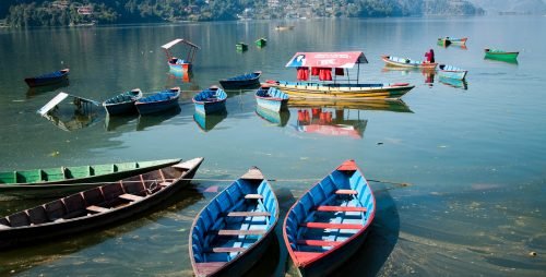 Boating on Phewa Lake in Nepal Family tour